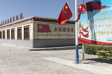 Government propaganda is displayed in a showcase Tibetan village in Golmud. Golmud, the third largest city on the Tibetan plateau, is developing as a key Chinese military staging point for nearby the...