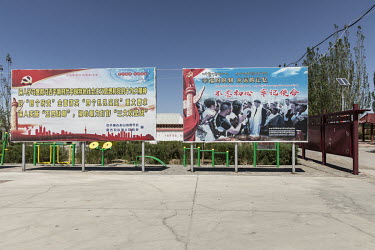 Government propaganda is displayed in a showcase Tibetan village in Golmud. Golmud, the third largest city on the Tibetan plateau, is developing as a key Chinese military staging point for nearby the...