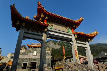 Temple gateway and towering mountain terrain in Tangchi town, the main settlement on tiny Beigan island.