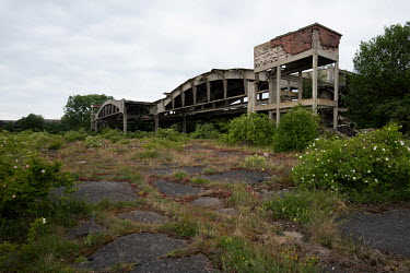 Aircraft hangars at the site of the former 'Neutief' German airfield, located on the Frische Nehrung, the Baltic Spit. The airport had two runways, a hydro harbour, three reinforced concrete hangars f...