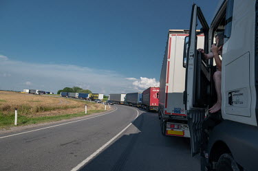 A 7 km queue of trucks leading to the Chernyshevskoye border checkpoint between Kaliningrad and Lithuania. Truckers can expect to cross the border after a four day wait. The control itself on both sid...