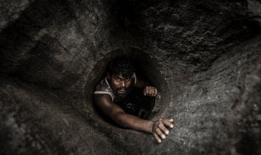 Manual scavenger Muna Kumar (28) working in Bokaro Steel City, Jharkhand.Sewer cleaning, known as manual scavenging, was made illegal in India in 1993, yet the highly dangerous practice remains widesp...