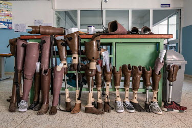 Newly made prosthetic legs stand on the floor in the workshop of the Princess Diana Orthopaedic Centre. 70% of the clinic's patients are landmine victims. Twenty years after the end of its civil war,...