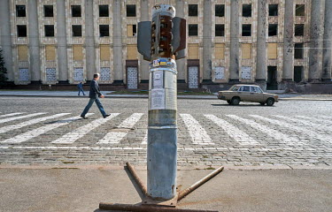 A Russian-made Tornado cluster rocket from 2015 displayed on Kharkiv Freedom Square in front of the damaged Regional State Administration building.Â�