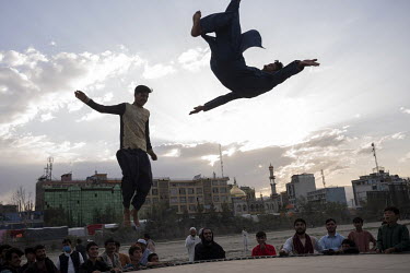 On a Friday (rest day) young people trampolining in Chaman-e-Hozori Park.