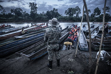 At 5am migrants leave the village of Canaan Mebrillo in the heart of the Darien Gap. They pay USD25 per person for each leg of a two-leg journey in dugout canoes.The Darien Gap is the missing link in...