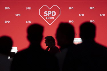 Delegates in front of heart logo SPD Berlin at a party congress of the SPD Social Democratic Party.