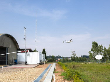 A drone takes off from the Zipline Muhanga drone airport. Each Zipline drone is designed to carry a payload of 1.8 kilos, has an operational range of 80 kilometers and cruises at 110Km/h in all weathe...