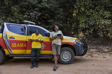 Indigenous photographer and filmmaker, Kamikia Kisedje (38), uses a drone to locate a fire outbreak near the Khikatxi village in the Wawi Indigenous Land, bordering the Xingu Indigenous Territory.Than...
