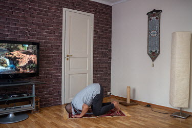 Wael, who is intersex, prays during the Islamic holy month of Ramadan. Wael is registered as female on official documents in his home country of Morocco, but identifies as a transgender man. Because c...