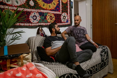 Khusen (right) and Komil (left), a gay couple from Dushanbe, Tajikistan, now living in Vienna, Austria.The couple relocated to Austria and sought asylum because of the dangers they faced as gay men in...