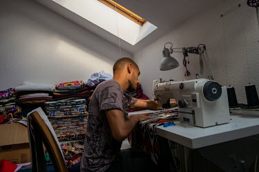 Khusen, from Dushanbe, Tajikistan, now living in Vienna, Austria, sewing traditional Tajik fabrics for his latest fashion designs. Khusen and his boyfriend Komil relocated to Austria and sought asylum...