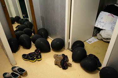 Balloons and shoes in Sergi and Igor's apartment.Faced with increasing levels of abuse in their hometown of Odessa along Ukraine's southern Black Sea coastline, Igor and his boyfriend Sergi decided it...