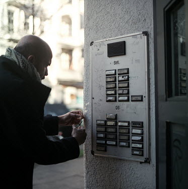 Hamoudi adding his finance's name to his apartment doorbell.Returning to his native Raqqa in 2011 to join anti-regime protests, Hamoudi and friends came to form a group called 'Our Rights Movement' in...
