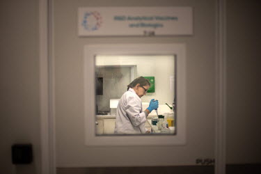 Dr Taigh Anderson performs analytical tests of purified mRNA to ensure it complies with regulatory guidelines, at the Afrigen Biologics and Vaccines laboratory. The mRNA will be used to produce COVID-...