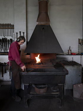 Dominique Meyer, a blacksmith from the Oeuvre Notre-Dame Foundation based on the Meinau site, where one of his tasks is to repair, sharpen, and craft new tools for the foundation's stonecutters and sc...