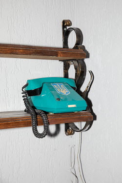 An old wired phone in a detention facility for Russian prisoners of war. According to the prison authorities, prisoners can contact their relatives using voice over IP for up to 15 minutes a day.