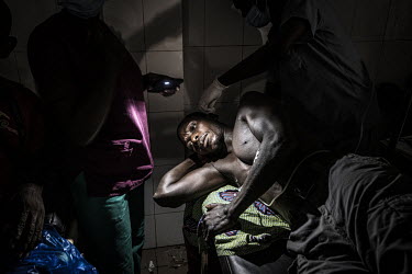 A patient at Sylvanus Olympio hospital, is operated on by the light from a mobile phone during a blackout.As motorcycle ownership in sub-Saharan Africa has grown from less than five million in 2010 to...