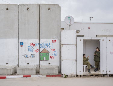 Operation and Observation Uniâ��t soldiers at the entrance of the Observation Room in the Kissufim IDF (Israel defence forces) base located at the border with Gaza. The unitâ�� belongs to the combat...
