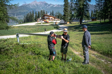 Mickael (31), Charley (28) and an intern carry out maintainance on a snow lance during the summer off-season. Mickael has been working in the ski area for six years now, all year round. The employees...