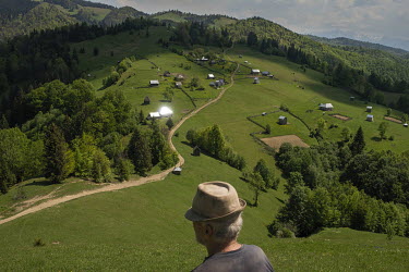 Petre Ghibus, one of the permanent residents who lives in a remote house in the mountain villageHigh in the mountains above Poienile de sub Munte, said to be Romania's largest village, is an unnamed c...
