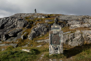 A bust of Greenlandic songwriter Jonathan Petersen on a hillside in the Nuuk suburbs.