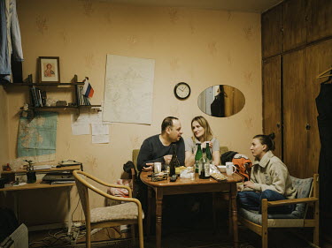 Marat, Tatjana and Nastya spend Sunday evening together in a typical Barentsburg apartment.