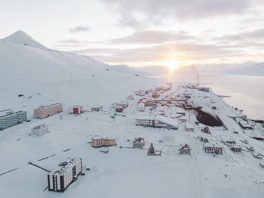 A view over the town and coal mine. The first European to discover Spitsbergen was the Dutch polar seafarer Willem Barentsz, who came across the resource-rich archipelago in 1596. Barentsburg, named a...