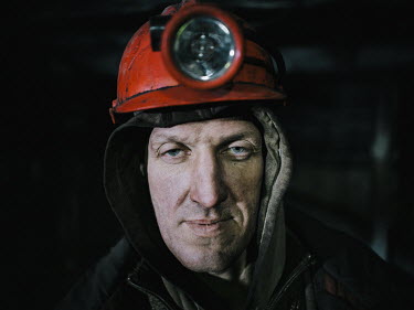 Alexander Yatsunenko at the end of his 8-hour shift below ground at a coal mine. During the Soviet-era miners were known as 'Poljarniki', Heroes of the Arctic.