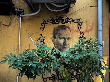 A graffiti image of Mustafa Kemal Ataturk within a spray painted frame on the walls of a bakery in Yeldegirmeni, Kadikoy.