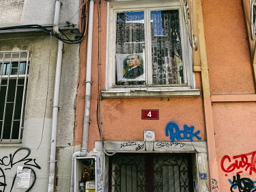 An image of Mustafa Kemal Ataturk hangs in a window in Kadikoy.
