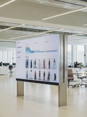 A video display screen shows realtime sales data from around the globe in the e-commerce department at the headquarters of multinational clothing company Inditex.