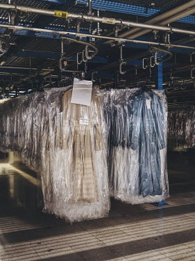 Garments await shipping in a logistics centre of multinational clothing company Inditex