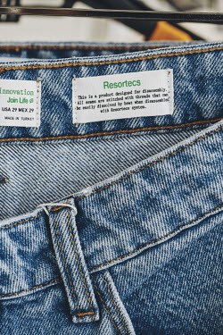 A pair of Bershka jeans, produced in collaboration with Belgian start-up Resortecs. Garments in this collection are stitched with threads that can be dissolved by heat, making disassembly easy, and th...