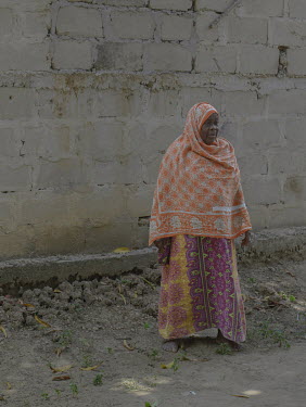 A woman, approximately 95 years old, who was allegedly attacked in her home by a nocturnal shape-shifting bat-like entity called 'Popobawa' ( 'bat wing' in Swahili ) at some time in the earlu 1970s.