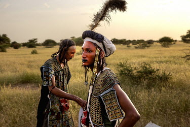 Every year at the end of the rainy season in September, the Wodaabe Fulani ( also called Bororos ) meet after a year of transhumance to celebrate Gerewol, a beauty contest, nuptial rite and dance show...
