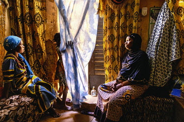 Women who are from the family of M. Ousmane Diallo, a Fulani dignitary. Women play an essential role in the Fulani community, which is often nomadic. Among the Fulani, for whom learning to live togeth...
