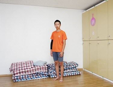 A 16-year-old patient suffering with an internet addiction in the room where he sleeps at the National Center for Youth Internet Addiction Treatment, commissioned by Ministry of Gender Equality & Fami...