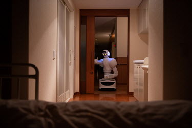 An Aeolous robot quietly opens the door of an empty room (during a demonstration) at the Activa Biwa nursing home during the night shift work in the city of Otsu. This self-navigating artificial intel...