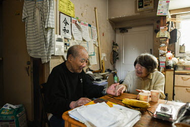 Taira Katsuta (89) and his wife Ichi (86) live together alone in a small apartment in Shinjuku ward. The couple are both suffering from dementia. They spend most of their time in their dining room. Ic...