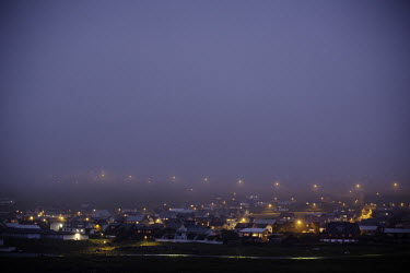 A view of the 'new' settlement in the capital Torshavn in the evening mist. With its 12,000 inhabitants, Torshavn is one of the world's smallest capitals.