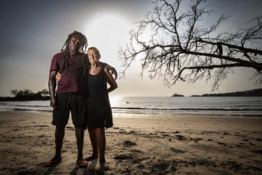 Jane Aspden and Tito Gbandewa, residents of Black Johnson Beach, south of Freetown. The beach is being developed as a port for Chinese fishing boats.In Sierra Leone, businesses are taking advantage of...