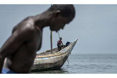 Fishermen landing their catch at Tombo Port.