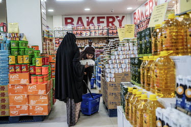 Women shopping at the Hayat Market supermarket, on one of the newest commercial streets in the Wadajir district.