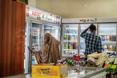 People shopping at the Hayat Market supermarket, on one of the newest commercial streets in the Wadajir district.