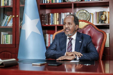 Hassan Sheikh Mohamud, President of Somalia, sits at a desk in his office in Villa Somalia, in the presidential compound, during an interview with the Financial Times.