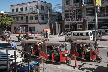 Tuk Tuks wait for passengers on one of the newest commercial streets in the Wadajir district.