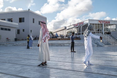 Young people socialise in the compound of the Ali Jimale Mosque, inaugurated in July 2022 in a wealthy area of the city.