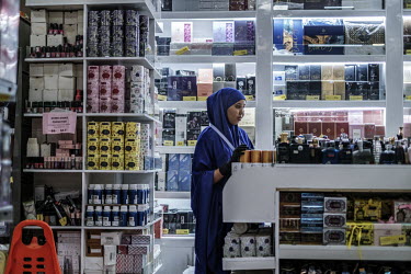 An employee working in the toiletries department at the Hayat Market supermarket, on one of the newest commercial streets in the Wadajir district.