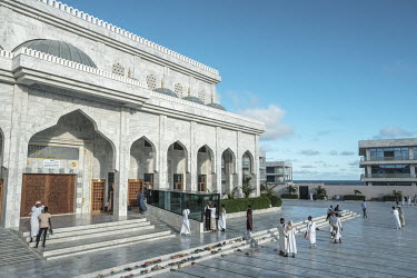 Young people socialise in the compound of the Ali Jimale Mosque, inaugurated in July 2022 in a wealthy area of the city.